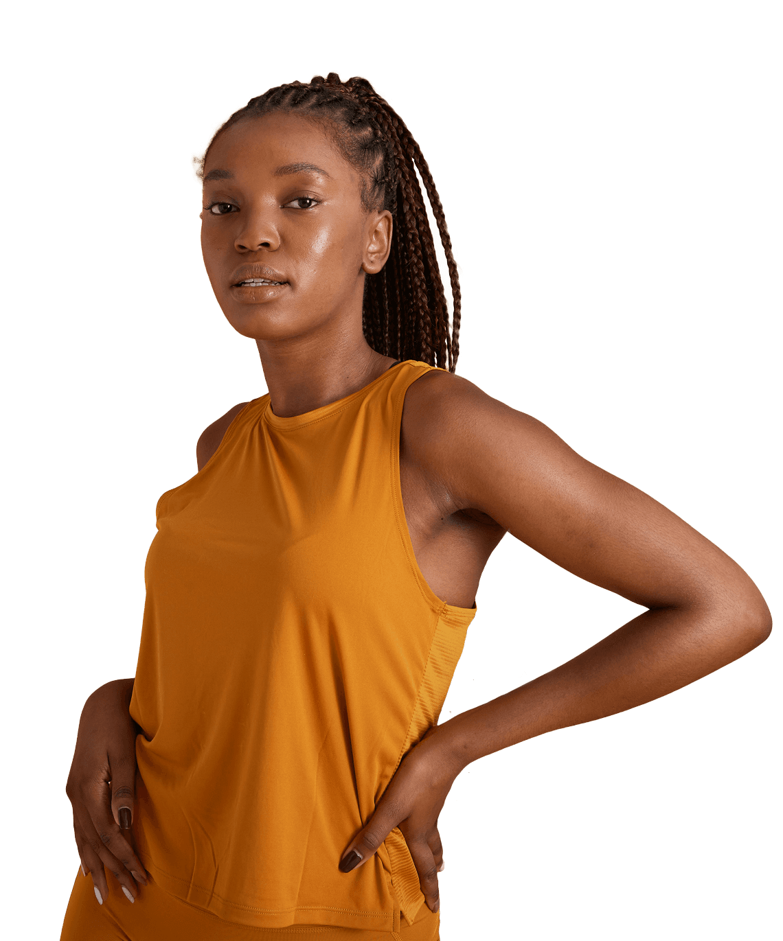 woman in orange tank top with hands on hips